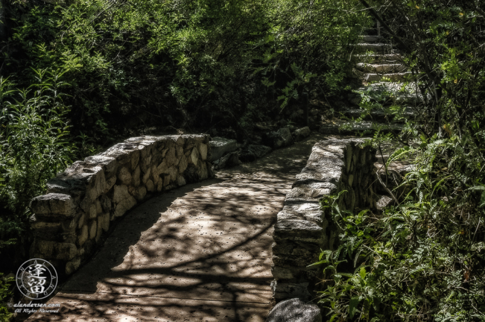 Stone bridge and stairs on a walking trail at Loews Ventana Canyon Resort in Tucson, Arizona.