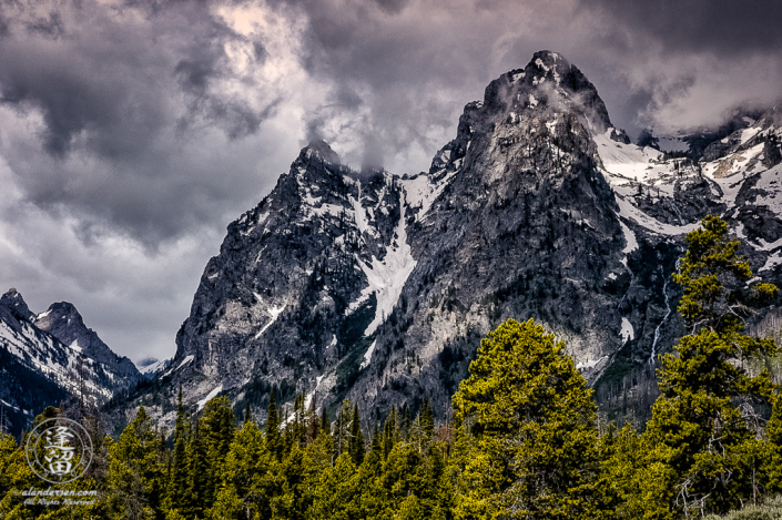 Summer storm brewing over Symmetry Spire and Storm Point in Grand Teton National Park, Wyoming.
