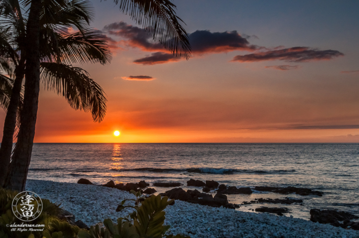 Hawaiian sunset and coral beach at waikoloa.