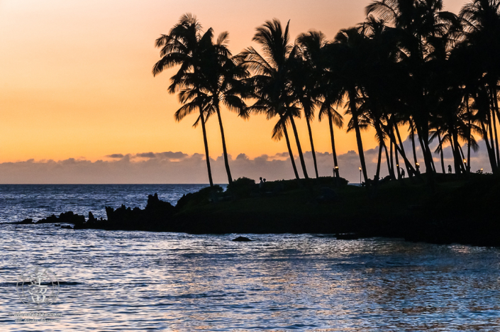 A sunset image of Buddha Point on the Big Island of Hawaii in silhouette.