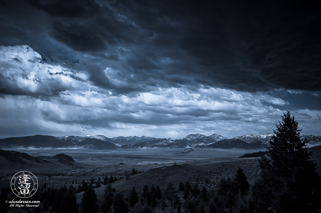 Storm clouds brewing over Madison River Valley near town of Ennis.