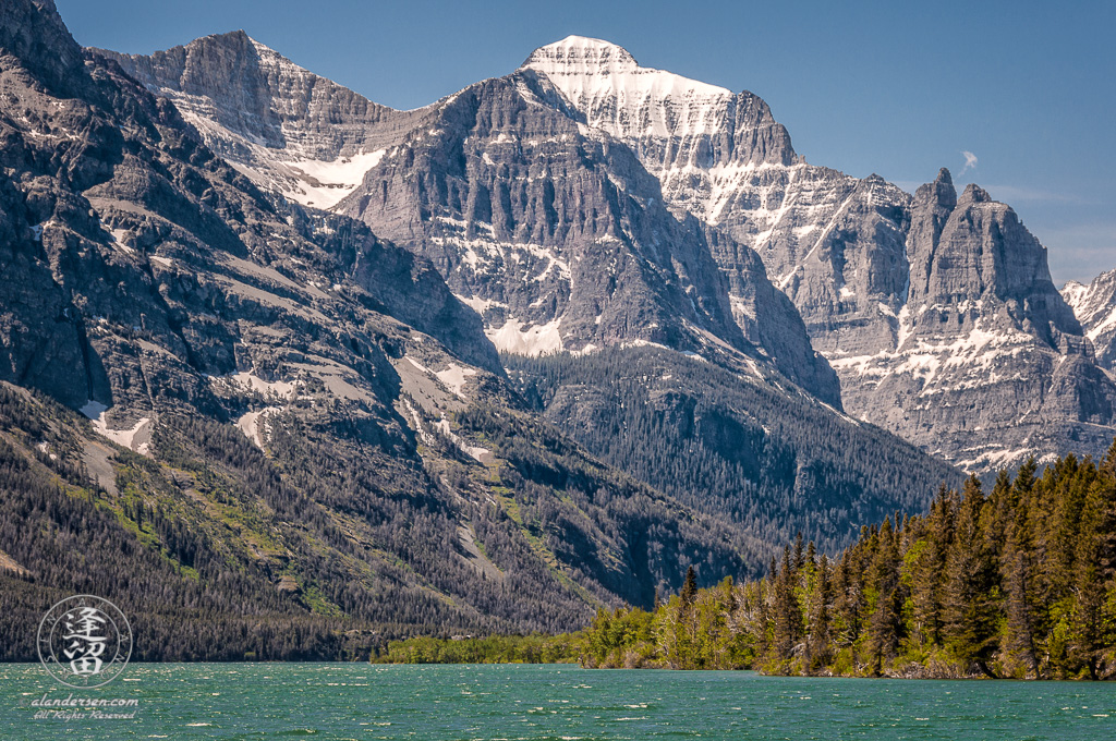 Mount Mahtotopa and Mount Little Chief rise over St. Mary's Lake.
