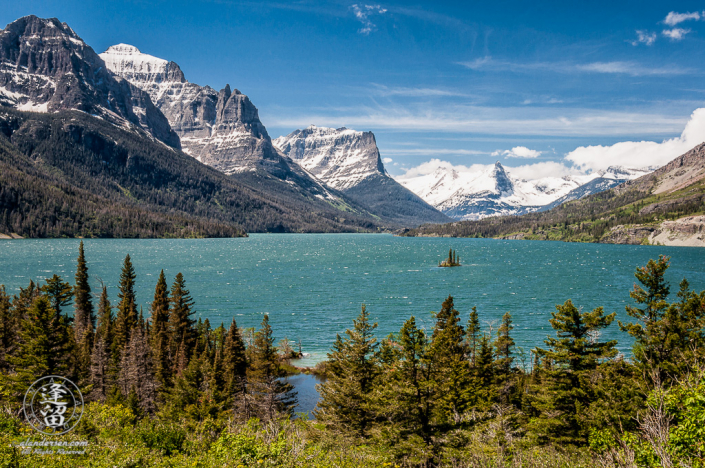 Wild Goose Island and the snow-clad mountain peaks that surround St. Mary's Lake.