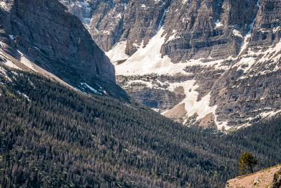 Going To The Sun Road 1 Going To The Sun Road curving around cliff before towering Little Chief mountain.