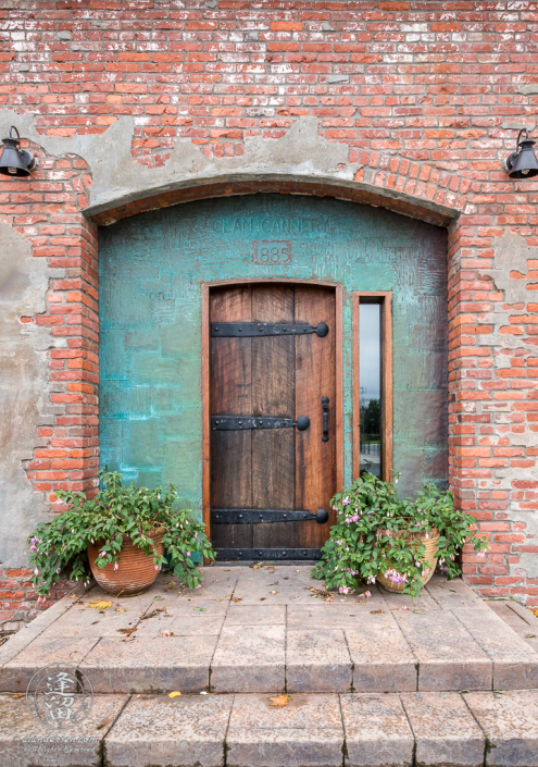 Wooden door to Clam Cannery in historic Port Townsend.