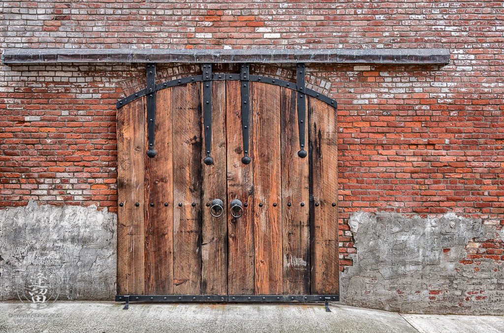 Closeup of wooden delivery door at Clam Cannery in Port Townsend, Washington.