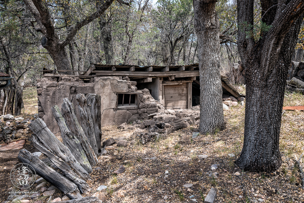 Adobe storage building built into side of hill that served as jail and root cellar at Camp Rucker in Arizona.