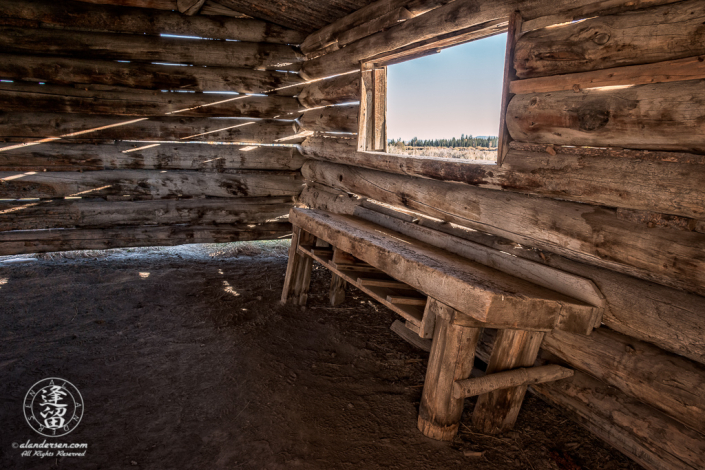 Wide-angle interior view of historical J. Pierce Cunningham Cabin in Grand Teton National Park, Wyoming.