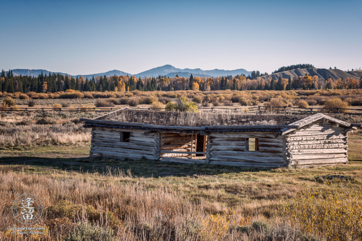 Exterior landscape view of historical J. Pierce Cunningham Cabin in Grand Teton National Park, Wyoming.