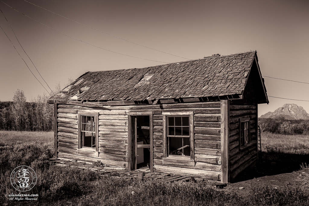 Neglected remains of cabin 736 at old Elk Ranch in Wyoming's Grand Teton National Park.