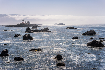 Battery Point Lighthouse And Fog 2 High-contrast view of Battery Point Lighthouse at Crescent City Bay in Northern California.
