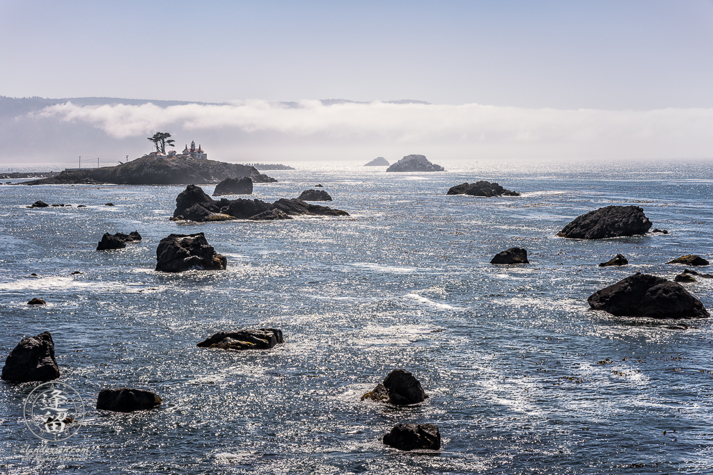 High-contrast view of Battery Point Lighthouse at Crescent City Bay in Northern California.