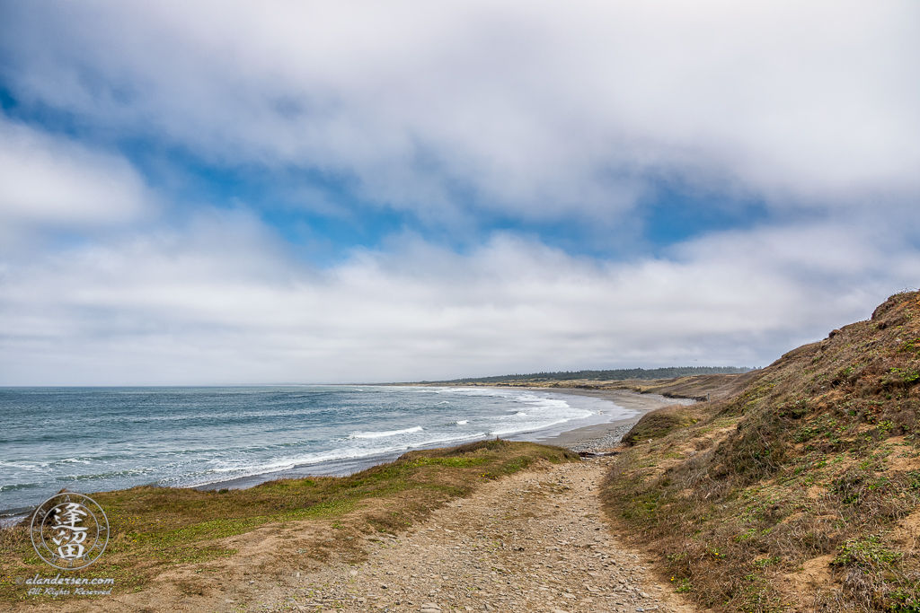The trail leading from the parking area at Point St. George, just North of Crescent City in Northern California, down to Kellog Beach, a long sandy beach that continues for miles up the Northern coastline