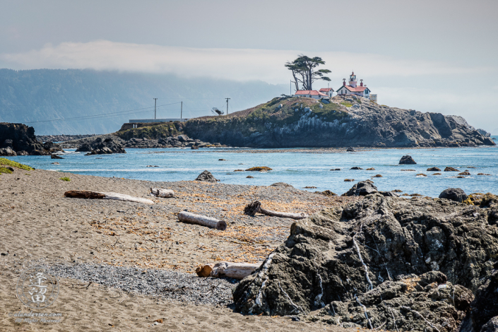 Battery Point Lighthouse seen from road-side beach at Crescent City in Northern California.