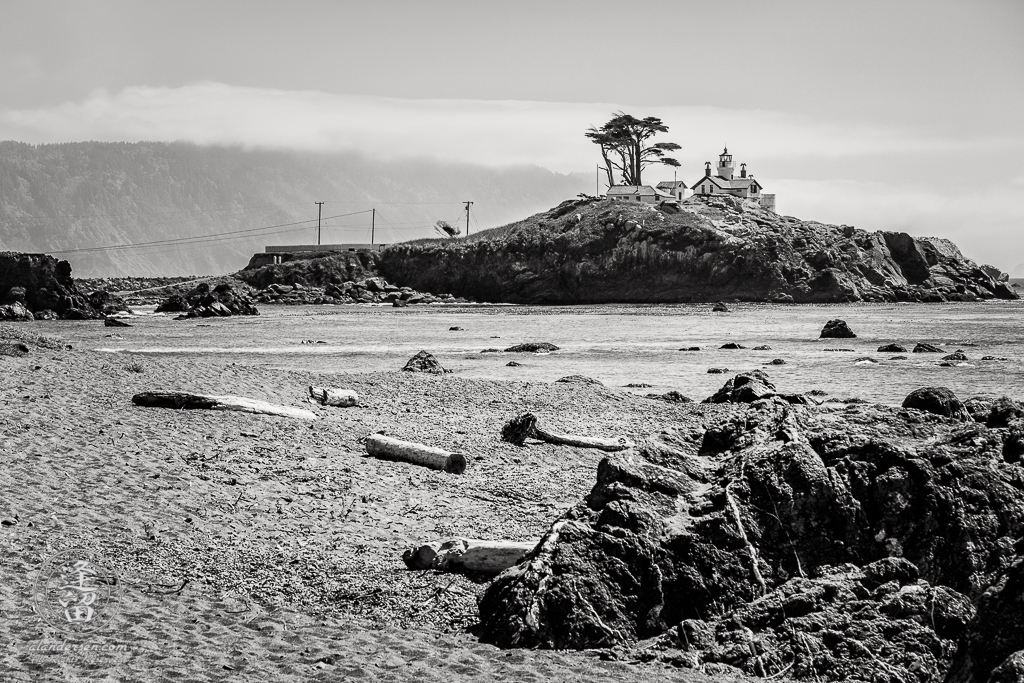 Battery Point Lighthouse seen from road-side beach at Crescent City in Northern California.