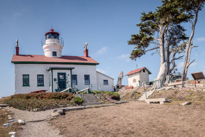 Battery Point Lighthouse Panorama Panoramic view of Battery Point Lighthouse sitting atop hill at Crescent City in Northern California.