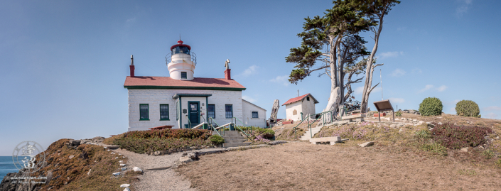 Panoramic view of Battery Point Lighthouse sitting atop hill at Crescent City in Northern California.