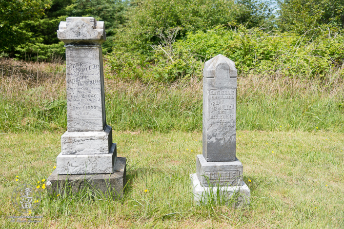 The tombstones for Frank and Catherine McMullen in the Cape Blanco Pioneer Cemetery at Cape Blanco State Park, outside of Port Orford in Oregon.