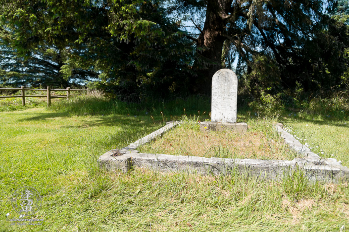 The tombstone for Willian O'Sullivan in the Cape Blanco Pioneer Cemetery at Cape Blanco State Park, outside of Port Orford in Oregon.