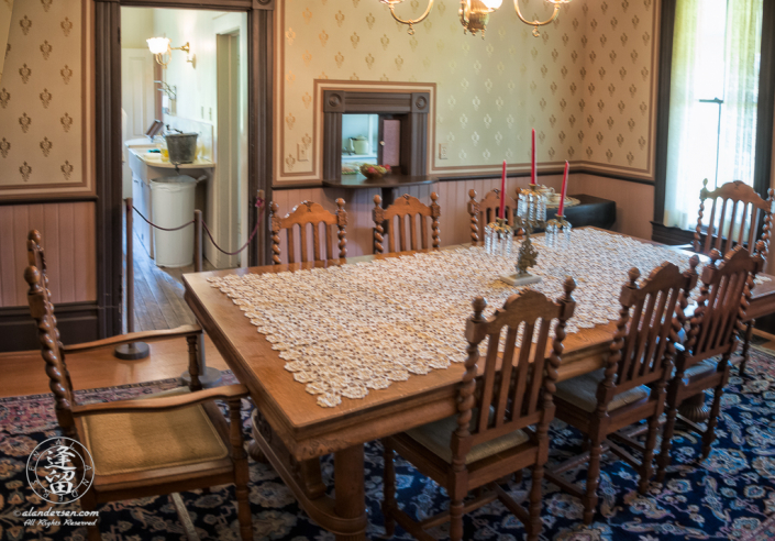 Dining Room of the Hughes House, near Port Orford, Oregon, showing the kitchen entry way.