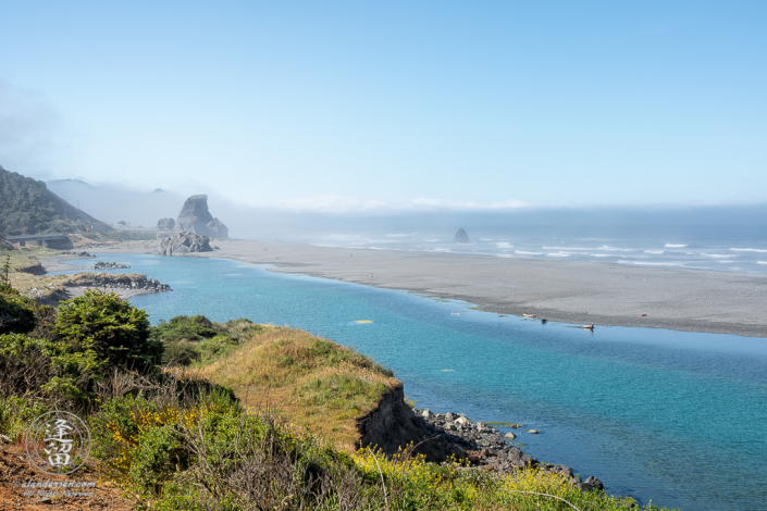 Kissing Rock on a sunny, yet misty morning South of Gold Beach in Southwestern Oregon.