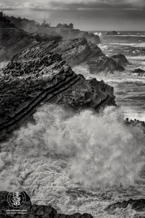 Pacific swells pound the rugged coast at Shore Acres State Park outside of Charleston in Oregon