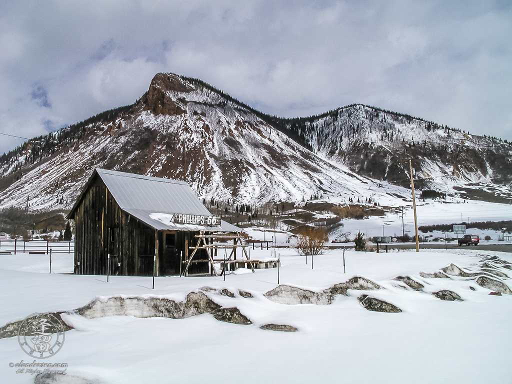 Old abandoned wooden Phillips 66 gas station in Colorado San Juan Mountains.