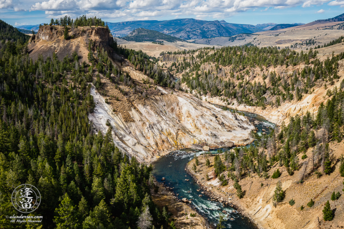 Milky-white Calcite Springs hydrothermal feature on the Yellowstone River.