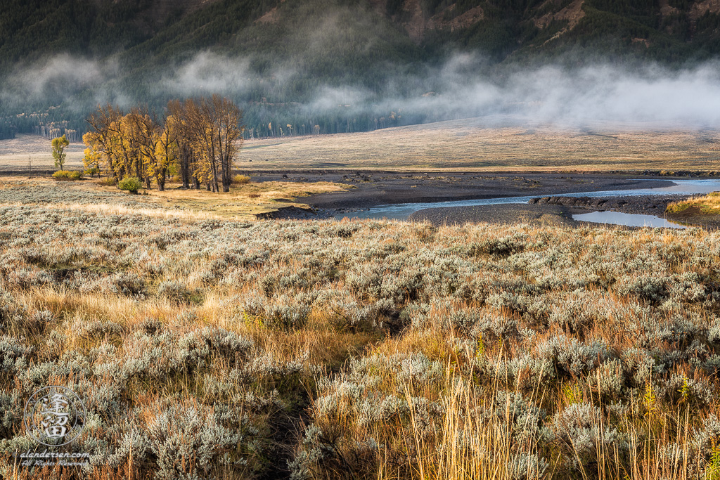 Clouds hanging low in Yellowstone National Park's Lamar Vally on a sunny but cold Autumn morning.