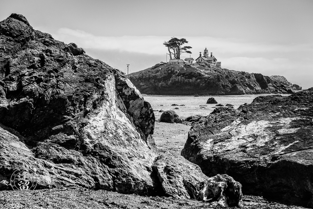 Battery Point Lighthouse seen from road-side beach at Crescent City in Northern California.