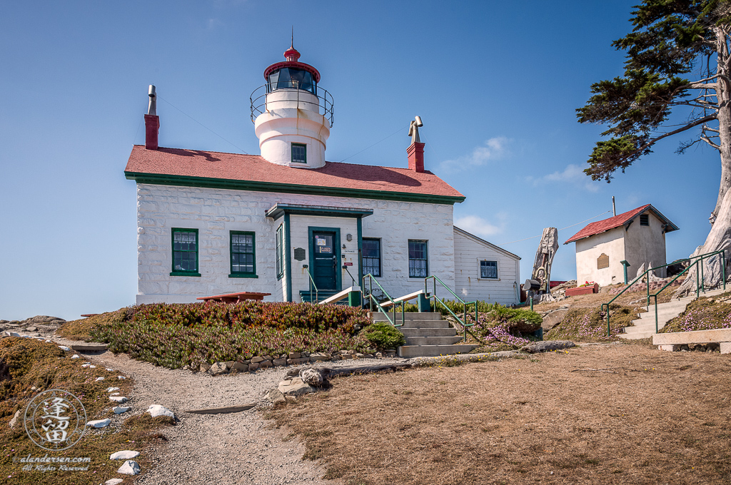 Front view of Battery Point Lighthouse sitting atop hill at Crescent City in Northern California.