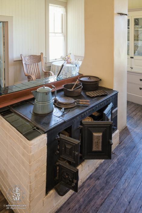 Iron free-standing stove in kitchen of Hughes Historic House near Port Orford, Oregon.