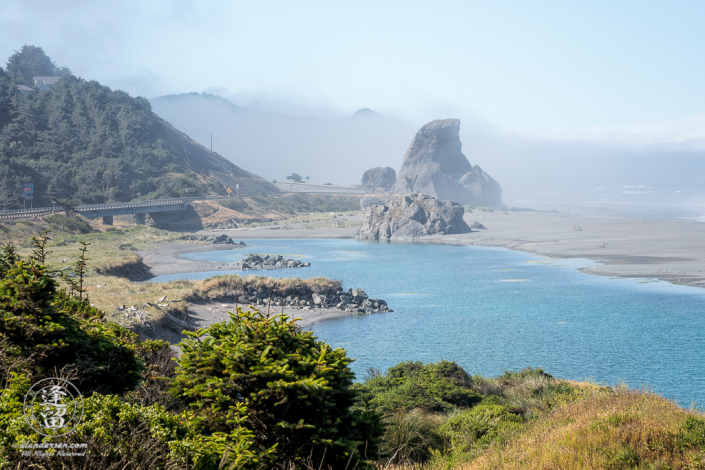 Kissing Rock on a sunny, yet misty morning South of Gold Beach in Southwestern Oregon.