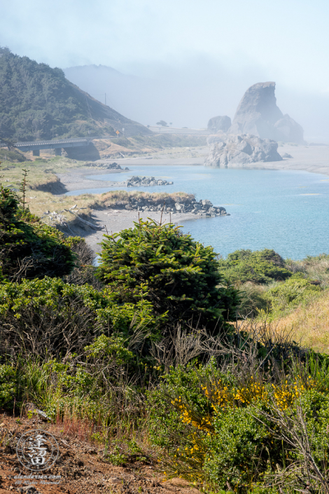 Kissing Rock on a sunny, yet misty morning South of Gold Beach in Southwestern Oregon.