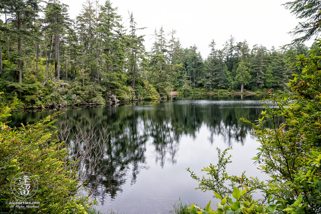 Cloudy morning at Lake Marie in the Umpqua Lighthouse State Park near Winchester Bay, Oregon.