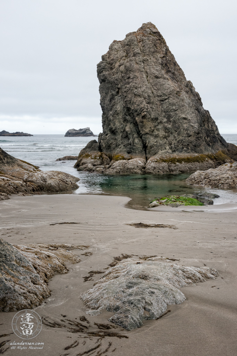 Seastacks and sand on the beach near Coquille Point at Bandon in Oregon.