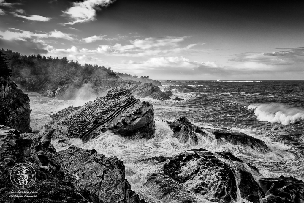 Pacific swells pound the rugged coast at Shore Acres State Park outside of Charleston in Oregon