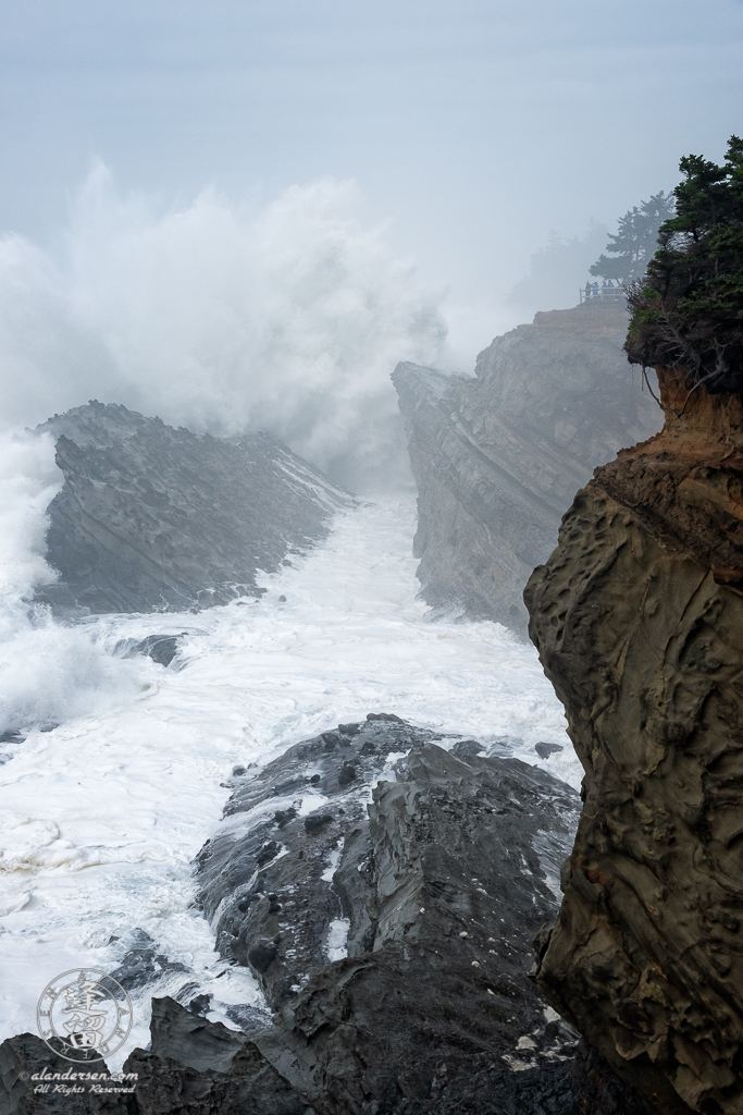 Massive waves pound the cliffs at Shore Acres State Park outside of Charleston in Oregon.