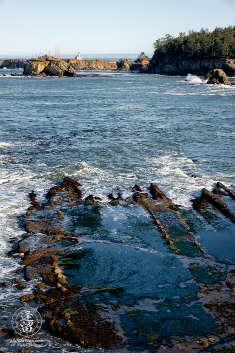 Cape Arago Lighthouse as seen from atop the cliffs near Norton Gulch at Cape Arago in Oregon.